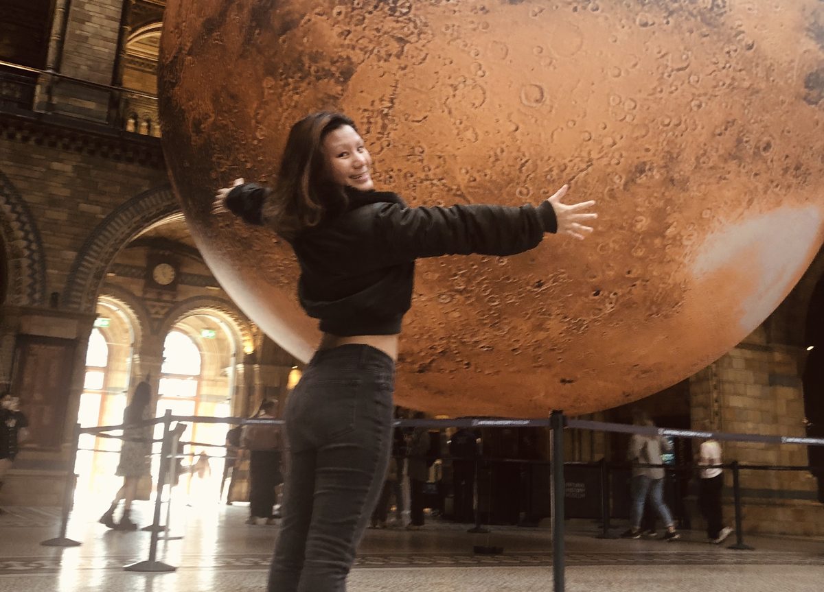 Rhea embracing a giant Mars installation